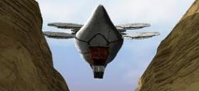 A battleship seen from behind and below, stops overhead.