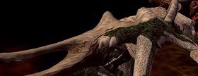 A painful expression appears on the dragon's face.