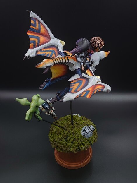 Azel and Edge Ride The Arm Wing Sculpture